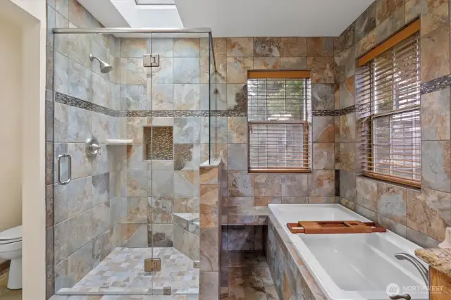 Heated floors, large soaker and frameless shower door
