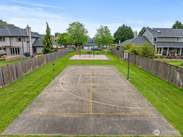 Community park, sport courts, swings, soccer field.