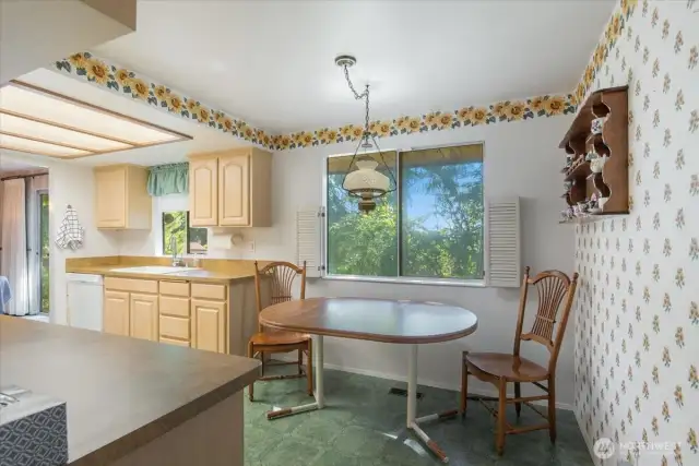 Kitchen offers room for a breakfast table.