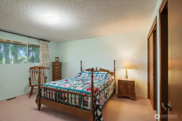 Primary bedroom with 3/4 ensuite bathroom.