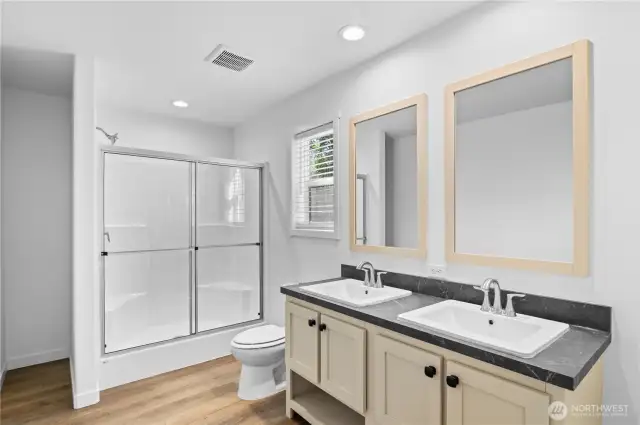 Primary bathroom with double sink vanity