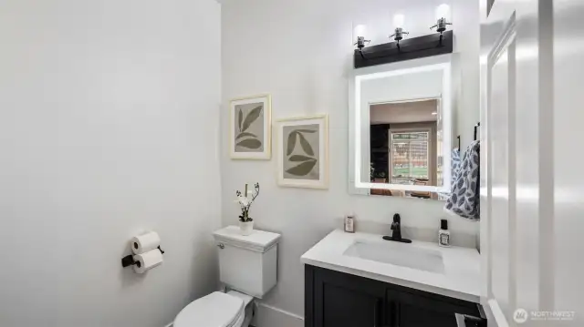 This convenient half bathroom downstairs is perfect for everyday use and guests