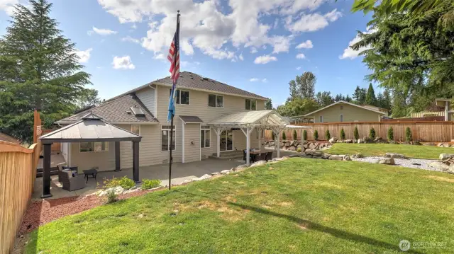 The backyard is fully fenced with a brand-new fence, providing added privacy and an excellent space for hosting private events!