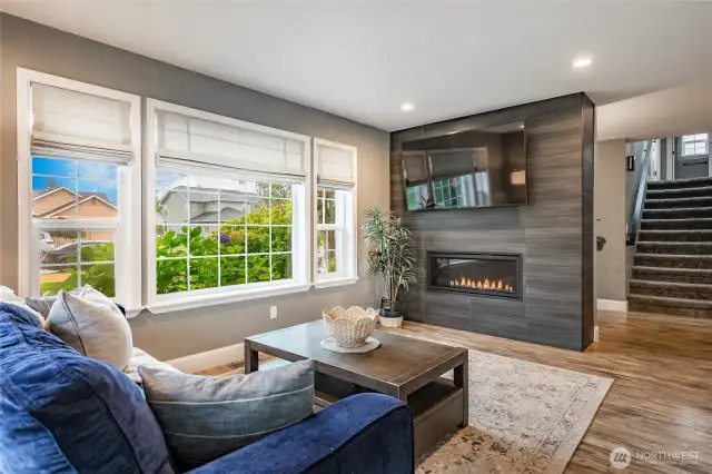 Cozy gas fireplace w/full tile surround