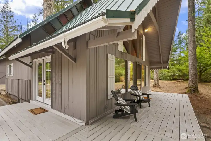 Wrap-around front porch connecting the front and side of the house.