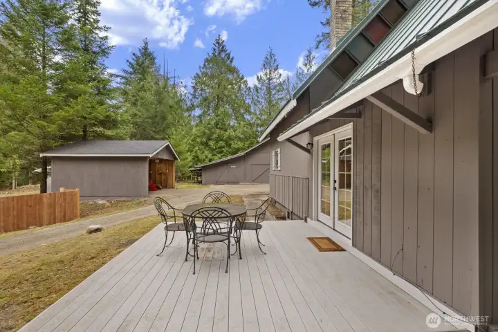 Enjoy indoor-outdoor living as French doors lead from the living area to a spacious Trex deck.