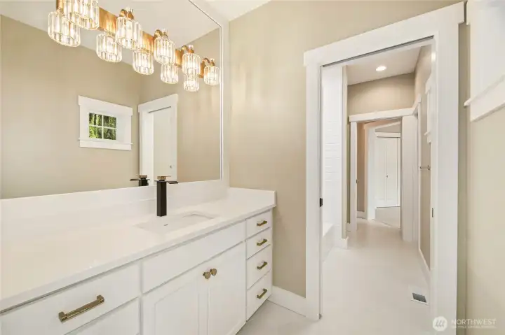Jack & Jill Bathroom w/ two vanities.