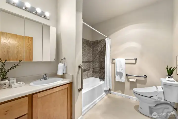 En-suite primary bath is roomy and well appointed.
