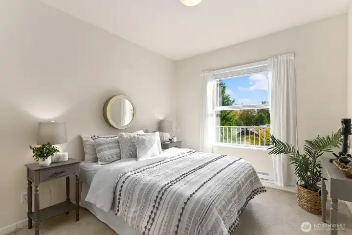 Second bedroom also offers southern exposure and ample closet space.