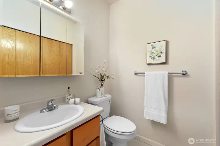 Half bathroom is convenient for guests.