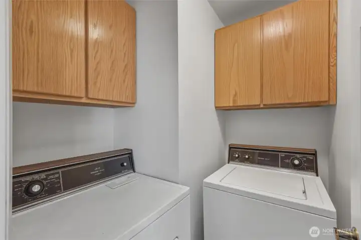 Laundry room with washer and dryer included