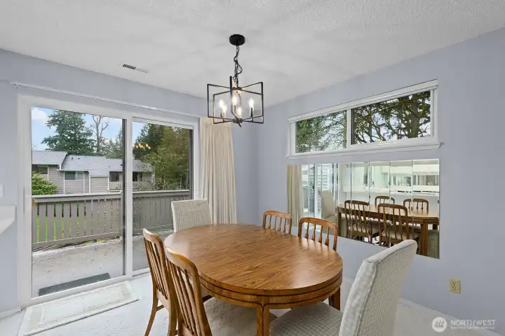Dining Room with privacy window and glass door to private deck