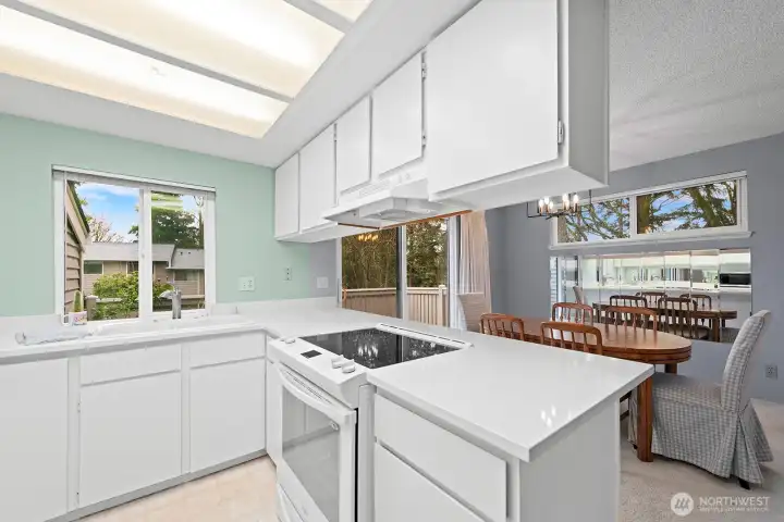 Bright, cheerful kitchen open to the Dining Room