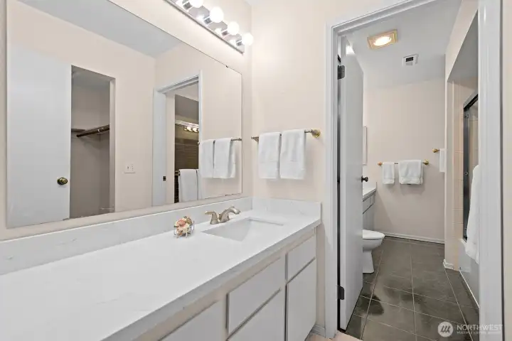 Primary with lockable door open to shower/toilet.