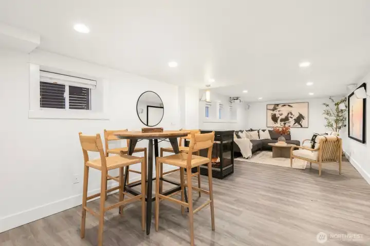 Lower level offers an enormous family room complete with a cozy fireplace and projector!