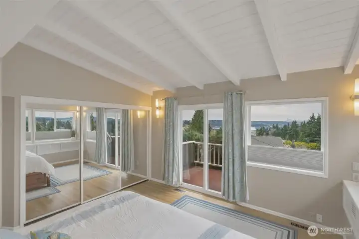Vaulted ceilings, closets and primary suite sunset views welcome you home