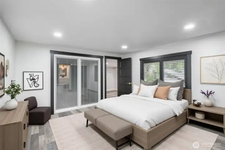 Primary bedroom with sliding door to patio