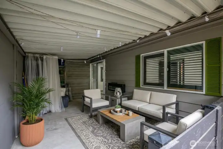 Patio off of primary bedroom or from front of house, Electric fireplace is out here! so many options