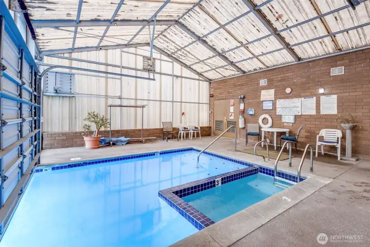 Pool showing the hot tub, open year round