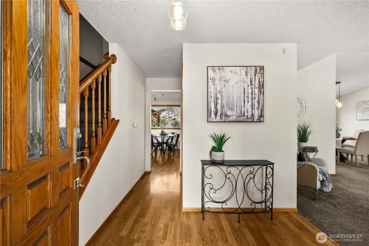 Entry way greets you as you step foot on hardwood floors.
