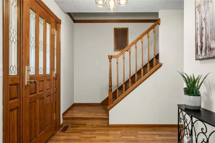 Head up the stairs to find a primary + three additional beds.