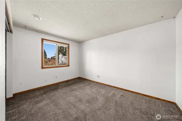 Bedroom no. 1 located on upper level.