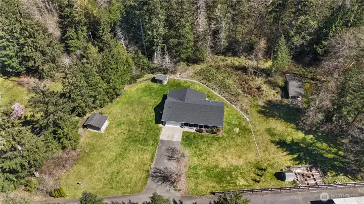 Plenty of space to customize your needs - multiple out buildings, garden space, long driveway