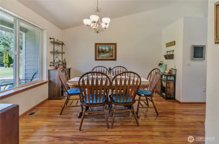 Formal dining area with a chanelier you won't hit your head on!
