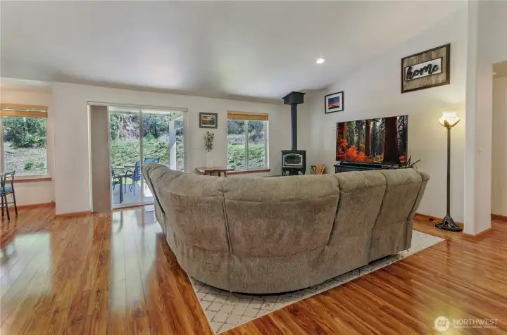 Tons of natural light coming in those windows and glass door