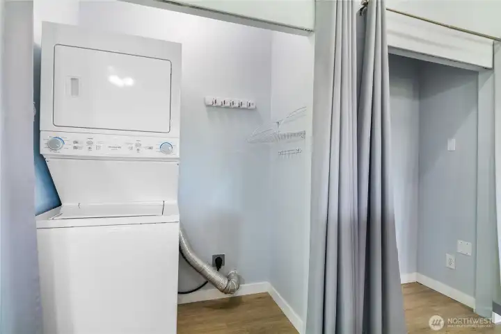 The stackable washer/dryer gives you lots of space for storage.