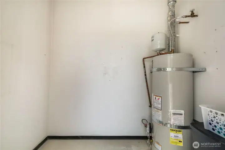 Hot water tank is in the storage closet off of the deck.