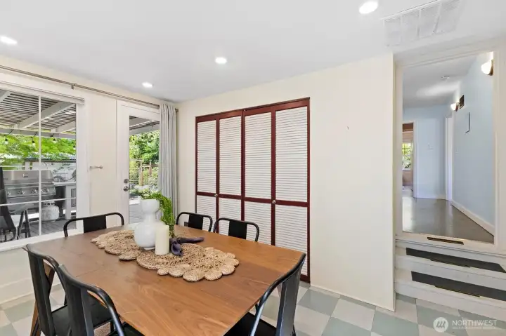 Flexible dining or bonus space with direct access to the backyard patio and deck.