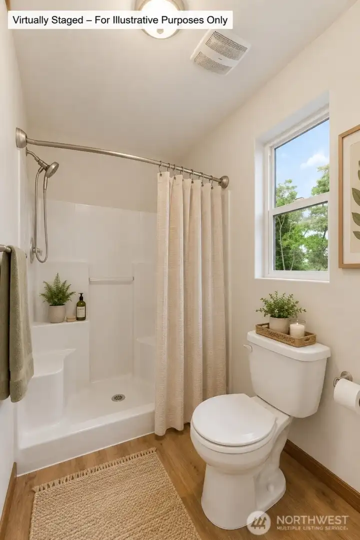 The large shower and window complete the primary 5 piece bath.