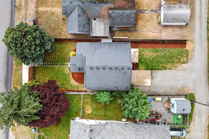 Overhead you will see the roof and gutters have been kept clean and ready for a new buyer. The alley is only accessible to 4 homes and is a dead-end for complete privacy.
