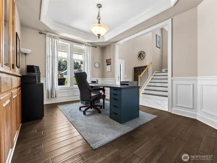 Formal Dining Room makes a perfect office space with natural light!