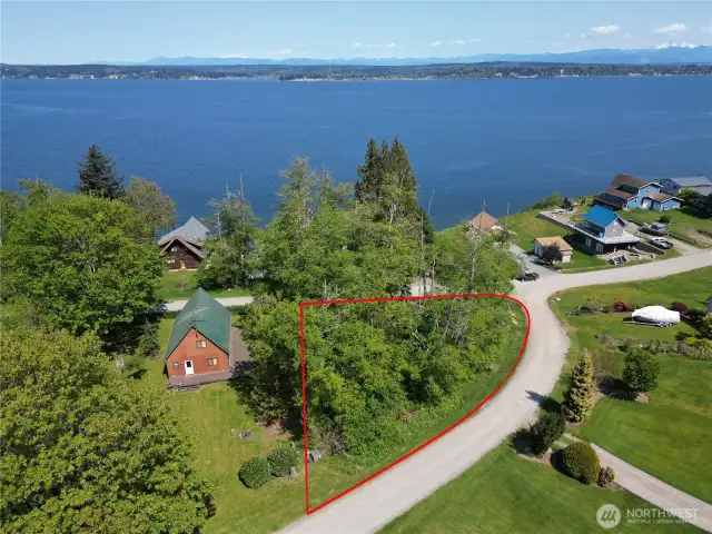 .24 acre corner lot, Mtn & water views, Percs for a 3 bedroom home.