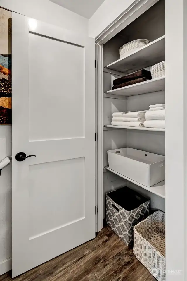 Large linen closet adjacent to the full bath.