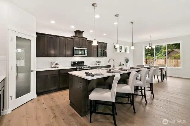 Home is under construction. Photos are of a previously built home from the same community with similar finishes that are staged. Builder reserves the right to change features, plans, prices & specifications without notice. Features vary by plan. Buyer to verify square footage.