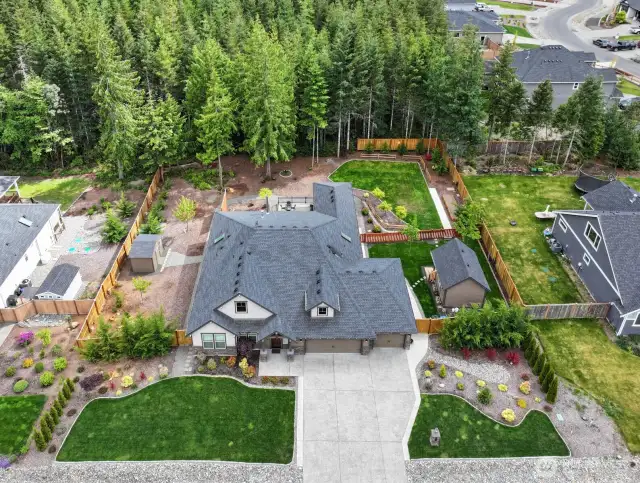 Fully landscaped .42 acre dream home.