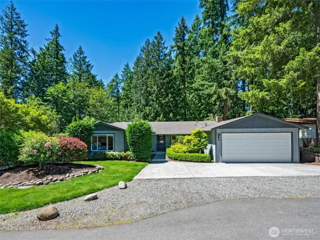 Lovely landscaping welcomes you home to this peaceful refuge.