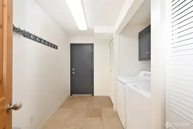 Ample storage cabinets make laundry day a breeze!