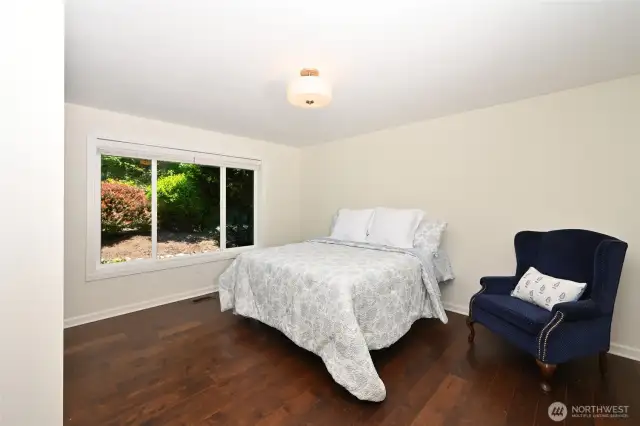 Your primary suite looks out on garden views.