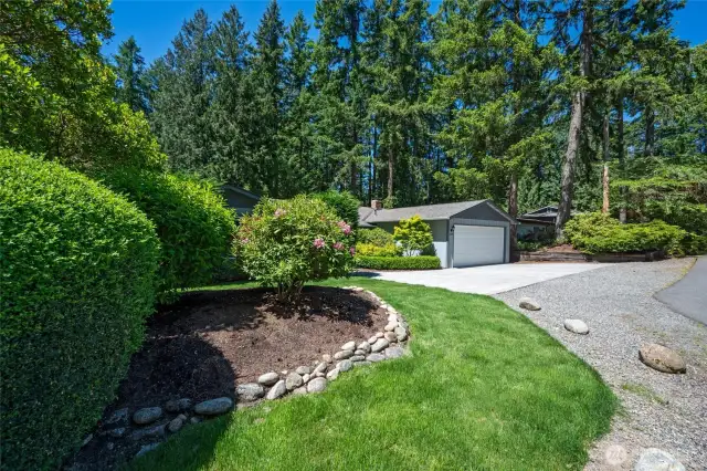 Quintessential Northwest greenery provides a lush, private backdrop.