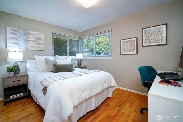 Large bedrooms with hardwood floors.