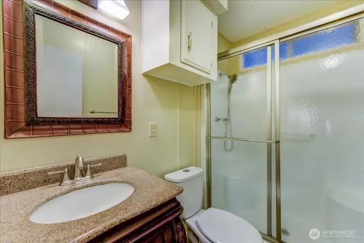 2nd bathroom with walk in shower.