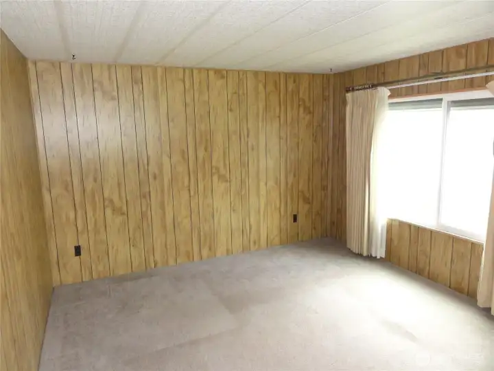 Very large living room running full length of side.