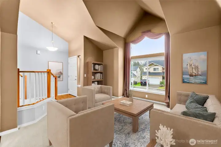 Formal living room with vaults that add visual interest