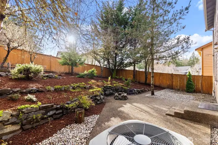 Private and fully fenced rear yard with terraces backs to a greenbelt