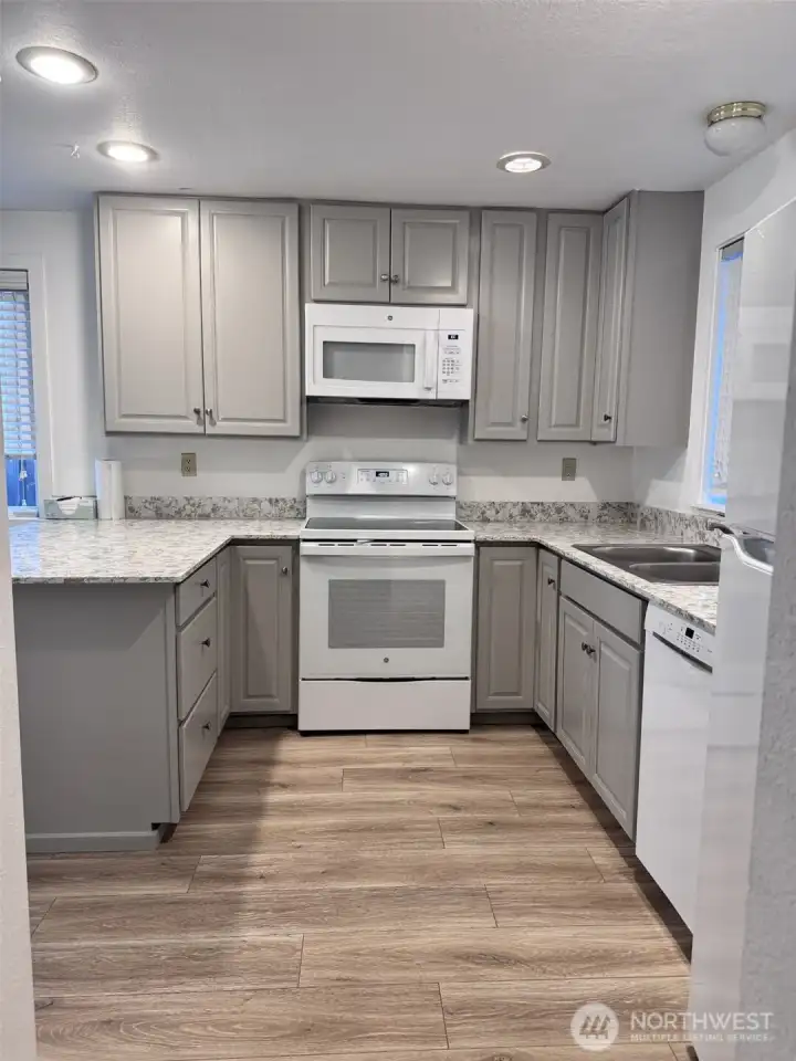 Unit 12722 - Kitchen cabinets were pained, new flooring