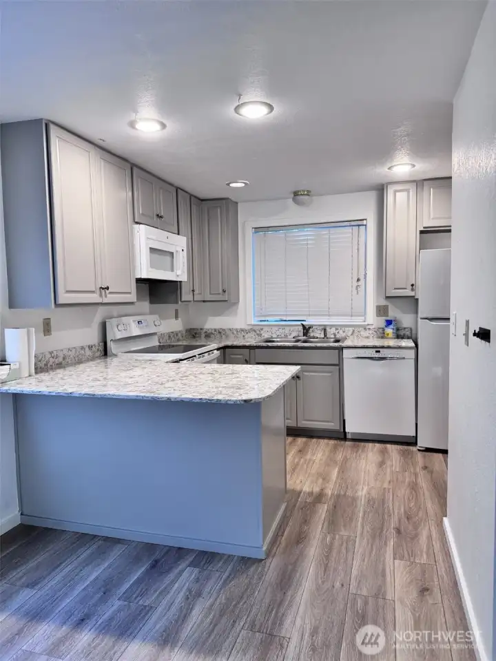 Unit 12722 - Beautiful Open Concept Kitchen with granit countertop